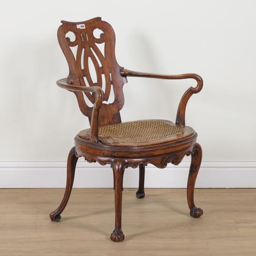 AN 18TH CENTURY ITALIAN WALNUT PIERCED SPLAT BACK OPEN ARMCHAIR