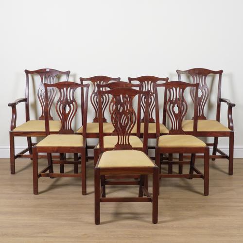 A SET OF EIGHT GEORGE III STYLE MAHOGANY PIERCED SPLAT BACK DINING CHAIRS (8)