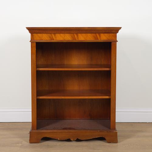 A REPRODUCTION MAHOGANY FLOORSTANDING OPEN BOOKCASE