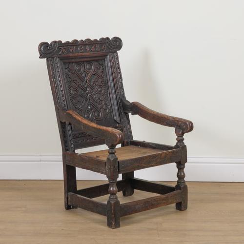 A 17TH CENTURY AND LATER OAK WAINSCOT ARMCHAIR