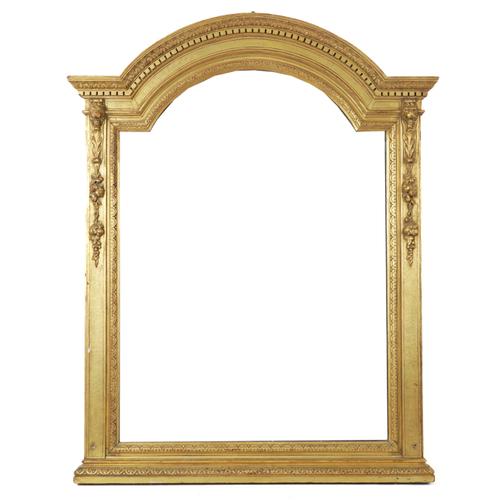 A VICTORIAN STYLE GILT FRAMED ARCHED TOP OVERMANTEL MIRROR
