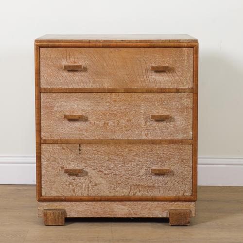 AN EARLY 20TH CENTURY LIMED OAK CHEST OF DRAWERS