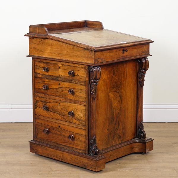AN EARLY 19TH CENTURY ROSEWOOD SLIDE TOP DAVENPORT