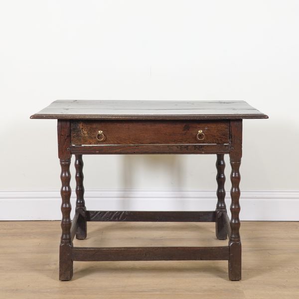 AN 18TH CENTURY OAK SINGLE DRAWER LOW SIDE TABLE