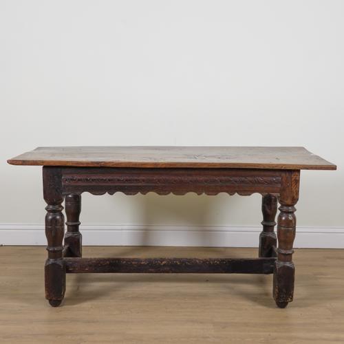 A 17TH CENTURY AND LATER OAK REFECTORY TABLE