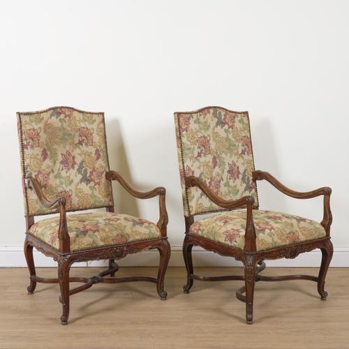 A PAIR OF LOUIS XV STYLE WALNUT OPEN ARMCHAIRS (2)