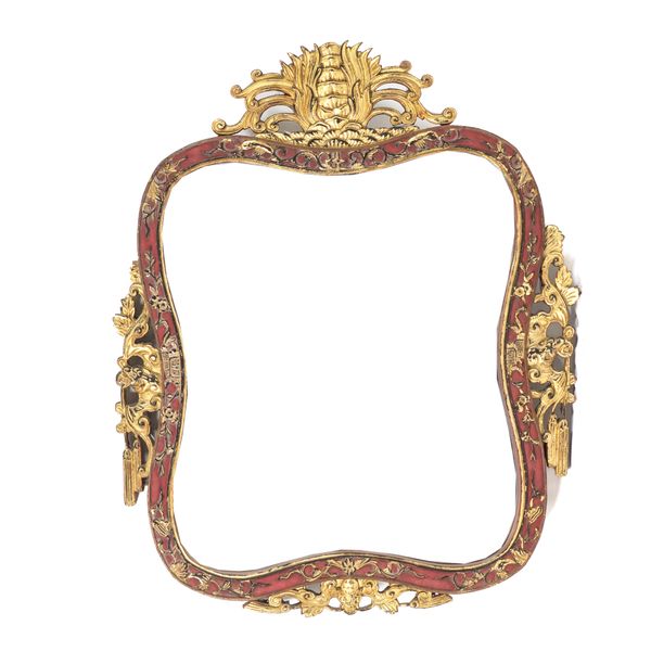 AN EASTERN RED LACQUER PARCEL GILT SHAPED WALL MIRROR (2)