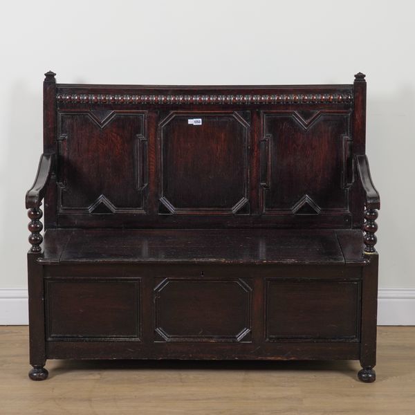 A 17TH CENTURY STYLE OAK BOX SEAT SETTLE