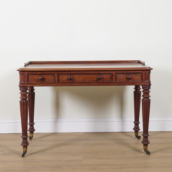 A REGENCY MAHOGANY WRITING TABLE