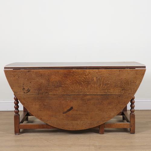 A 17TH CENTURY OAK GATE LEG TABLE