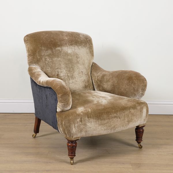 A VICTORIAN STYLE UPHOLSTERED EASY ARMCHAIR