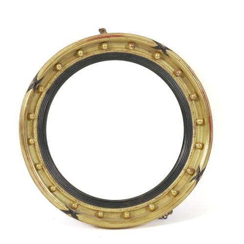 A REGENCY STYLE GILT FRAMED CONVEX MIRROR