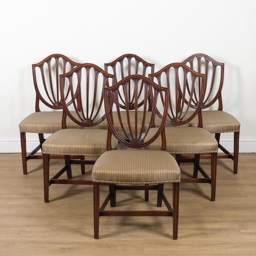 A SET OF SIX GEORGE III MAHOGANY SHIELD BACK DINING CHAIRS (6)