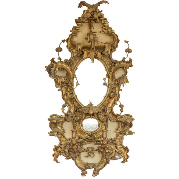A 19TH CENTURY ROCOCO GILTWOOD WALL MIRROR