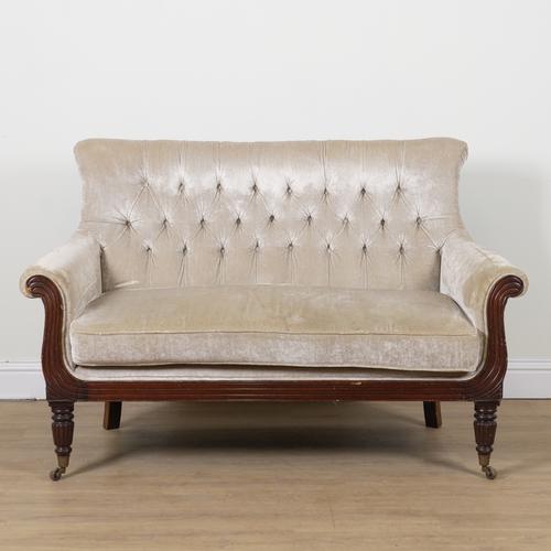 A REGENCY STYLE MAHOGANY FRAMED BUTTON BACK SOFA