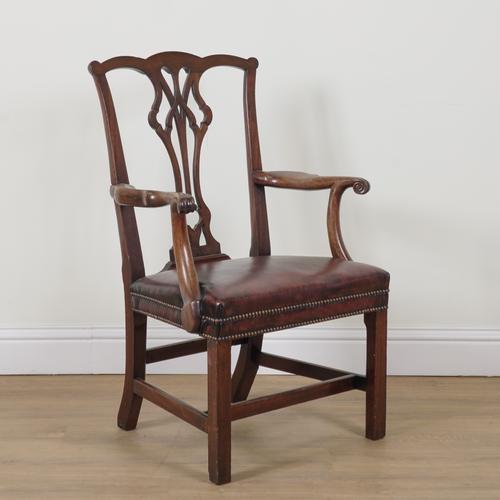 A GEORGE III MAHOGANY OPEN ARMCHAIR