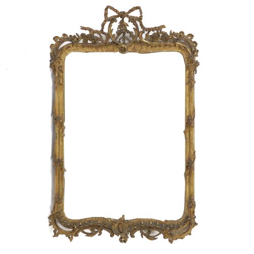 A 19TH CENTURY SHAPED RECTANGULAR GILT FRAMED WALL MIRROR
