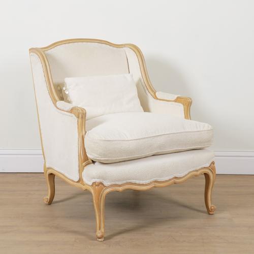 A LOUIS XV STYLE BEECH FRAMED WING BACK EASY ARMCHAIR