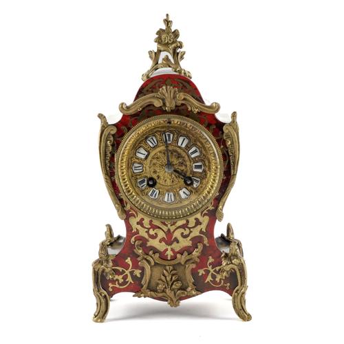 A FRENCH BRASS MOUNTED BOULLE STYLE INLAID TORTOISESHELL MANTEL CLOCK