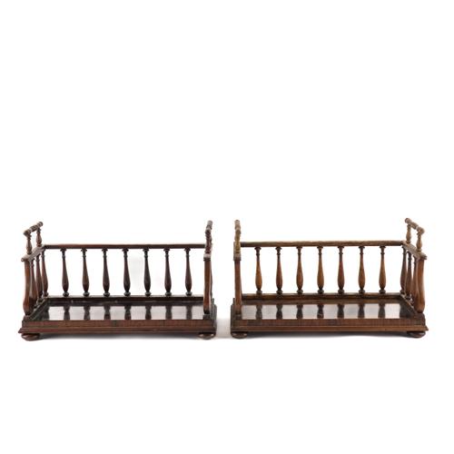 A PAIR OF REGENCY ROSEWOOD BOOK STANDS OR BOOK CARRIERS (2)