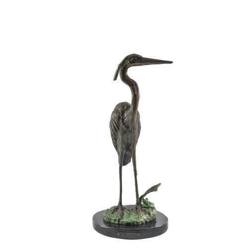CARL WAGER (AMERICA 1938-2001): A BRONZE MODEL OF A HERON ENTITLED 'WATERSIDE'