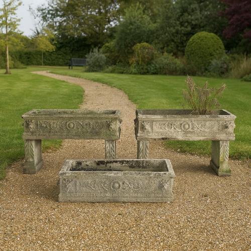 A SET OF THREE RECTANGULAR RECONSTITUTED STONE PLANTERS (3)