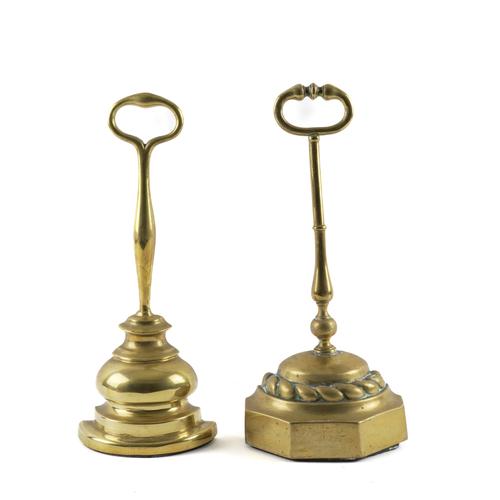 TWO VICTORIAN BRASS WEIGHTED DOOR STOPS (2)