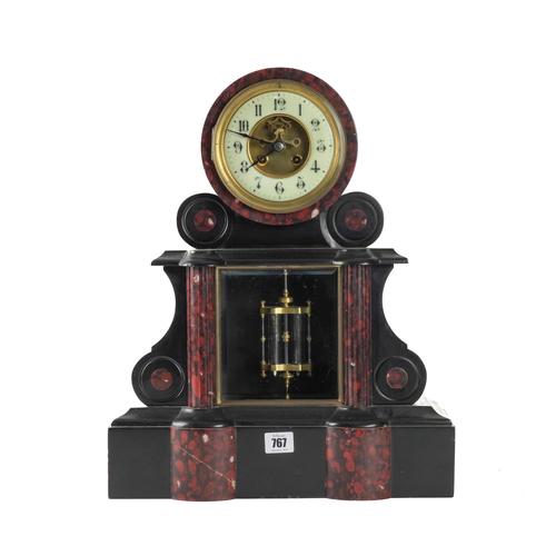 A FRENCH SLATE AND ROUGE GRIOTTE MANTEL CLOCK