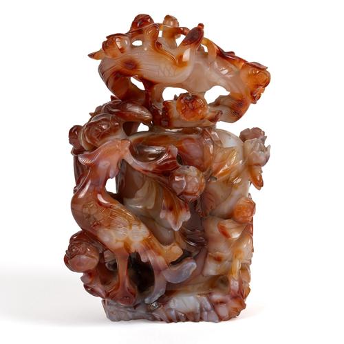 A CHINESE CARNELIAN AGATE VASE AND COVER (2)