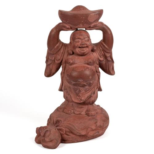 A CHINESE TERRACOTTA FIGURE OF BUDAI