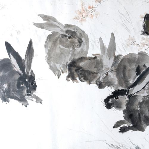 A LARGE CHINESE PRINT OF HARES BESIDE ROCKS