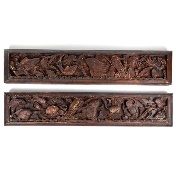 A PAIR OF CHINESE PARCEL-GILT RECTANGULAR WOOD FRIEZES (2)