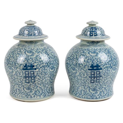 A PAIR OF CHINESE BLUE AND WHITE BALUSTER VASES AND COVERS (4)
