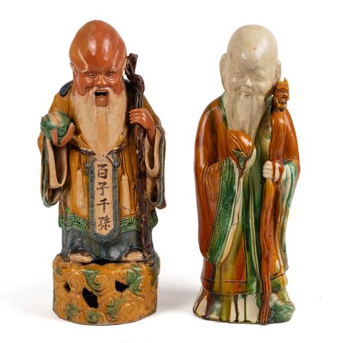 TWO CHINESE SANCAI TYPE GLAZED EARTHENWARE FIGURES OF SHUOLAO (2)