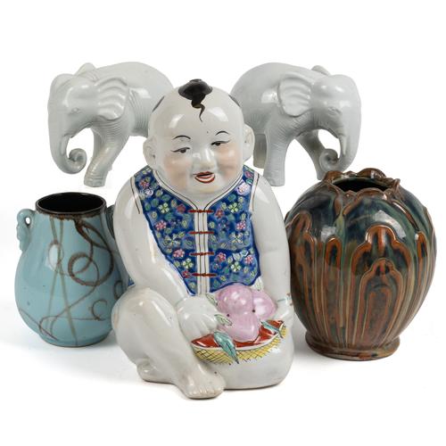 A CHINESE FAMILLE ROSE FIGURE OF A BOY (5)