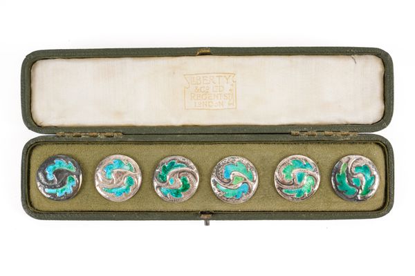 A MATCHED SET OF SIX LIBERTY AND CO SILVER AND ENAMELLED BUTTONS (6)