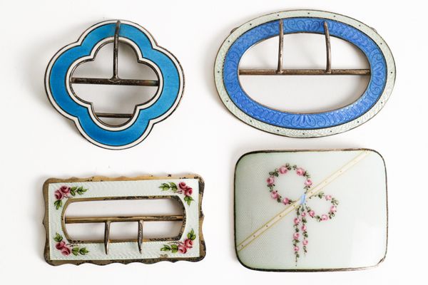 FOUR SILVER AND ENAMELLED BUCKLES (4)