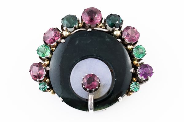 ATTRIBUTED TO DORRIE NOSSITER: A GEMSET CLIP BROOCH