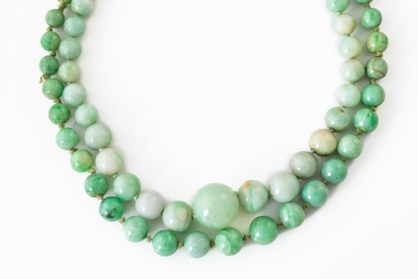 TWO JADEITE JADE BEAD NECKLACES (2)