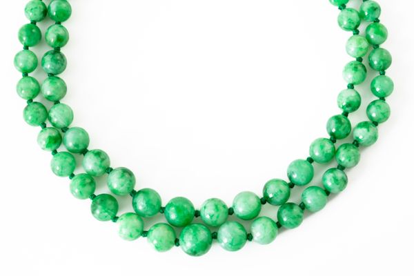 A JADEITE JADE DOUBLE ROW GRADUATED BEAD NECKLACE