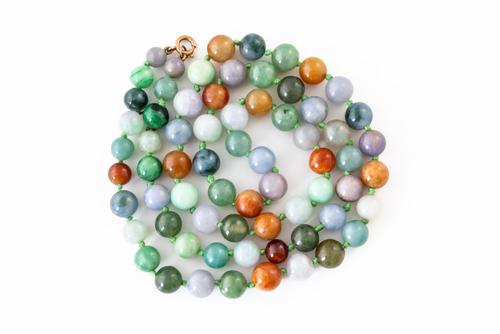 A JADEITE JADE BEAD NECKLACE