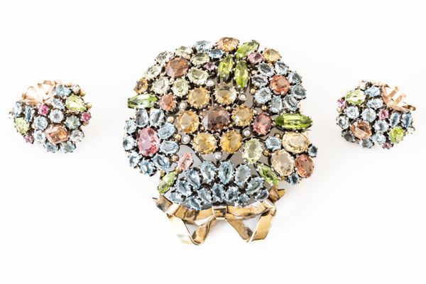 ATTRIBUTED TO DORRIE NOSSITER: A GEMSET BROOCH AND EARRING SET (3)