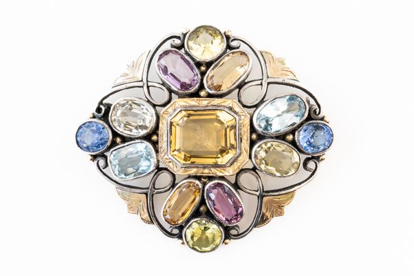 SIBYL DUNLOP - A GEMSET BROOCH