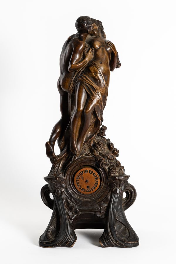 AN AUSTRIAN ART NOUVEAU CERAMIC FIGURAL MANTEL CLOCK