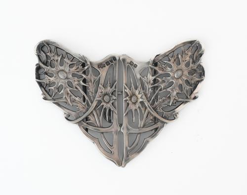 A SILVER TWO PIECE WAISTBELT BUCKLE