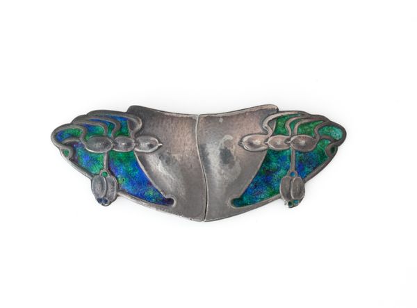 A LIBERTY AND CO SILVER AND ENAMELLED ART NOUVEAU TWO PIECE WAISTBELT BUCKLE