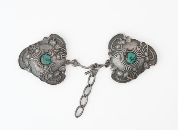 A LIBERTY AND CO SILVER TURQUOISE MATRIX TWO PIECE ART NOUVEAU CLOAK CLASP