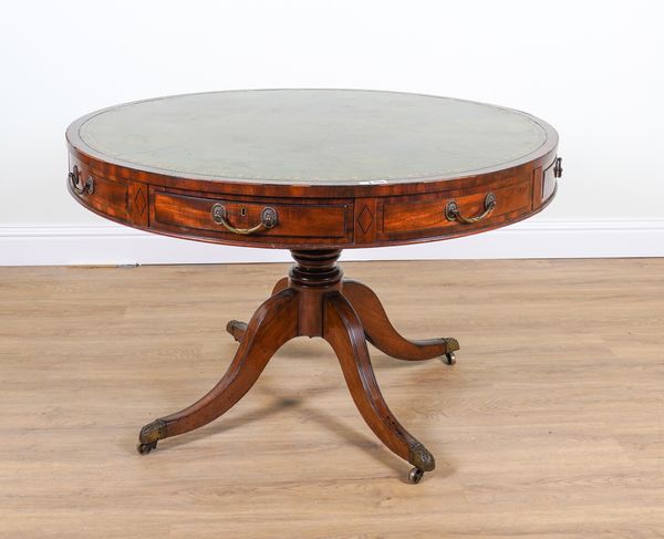 A LATE GEORGE III MAHOGANY CIRCULAR DRUM TABLE