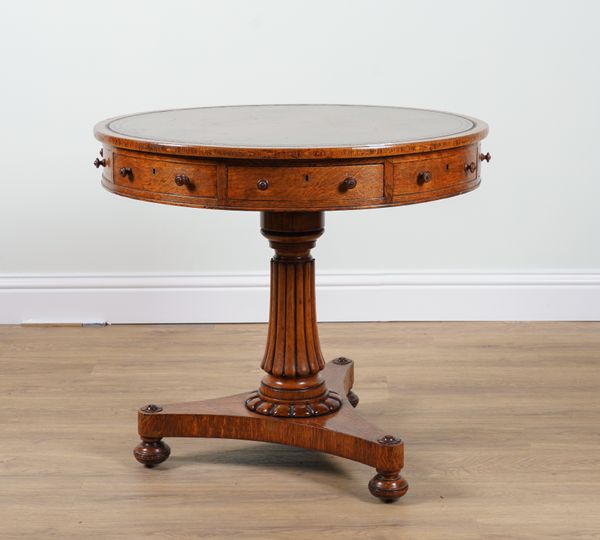 A WILLIAM IV OAK DRUM TABLE