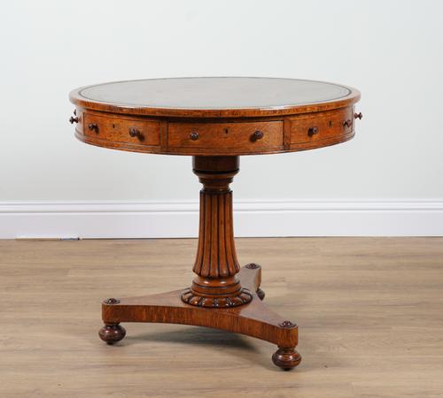 A WILLIAM IV OAK DRUM TABLE